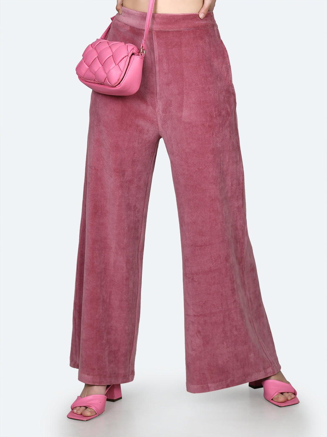 Pink Solid Flared Pants For Women