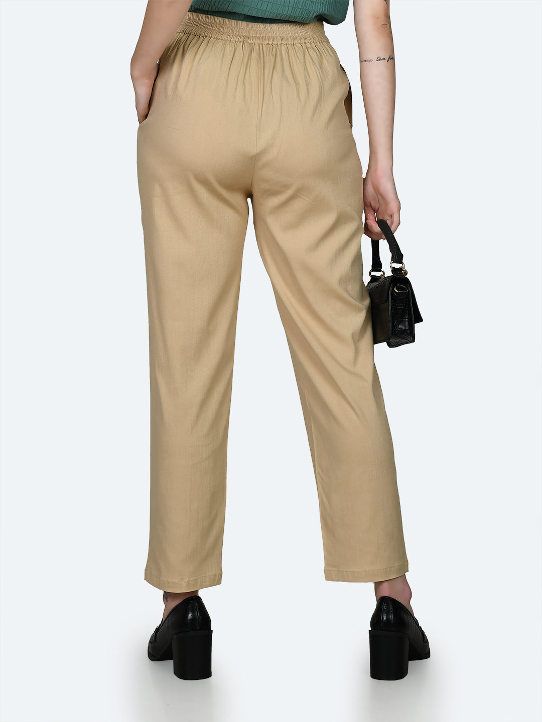 Beige Solid Trousers For Women